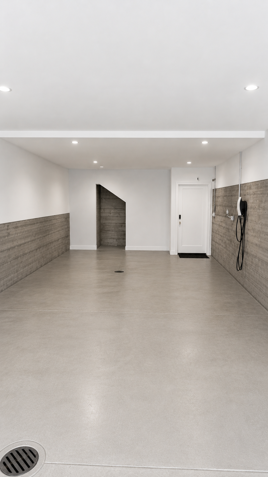Minimalist industrial garage interior — R. Da Silva Construction garages & conversions project, Marin County & East Bay